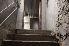 1st Floor Boiler Room (looking east up steps toward 1st floor hallway)