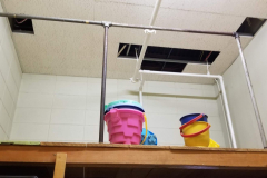 Looking north in gym storage across from phy ed office