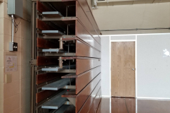 1st Floor Gymnasium - East Section (looking south toward temporary office with folded up bleachers on east wall)