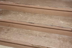 Leading to under steps storage on south end of building - looking north