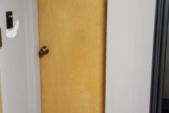 Looking north at restroom in 214