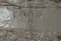 Pat M etching in brick